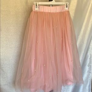 Pink shirt with pearl details